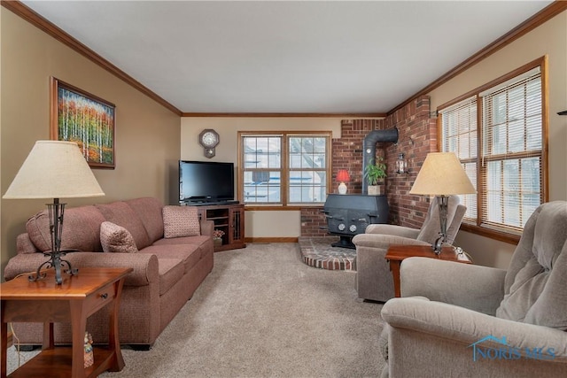 carpeted living area featuring a healthy amount of sunlight, a wood stove, baseboards, and crown molding