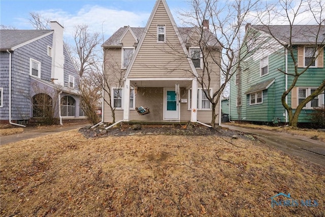 4526 Eastway St, Toledo, OH 43612 - view of front of property with a chimney