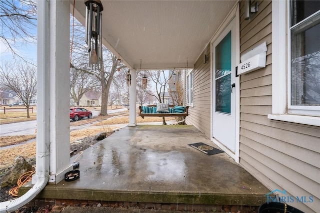 4526 Eastway St, Toledo, OH 43612 - view of patio / terrace with a porch