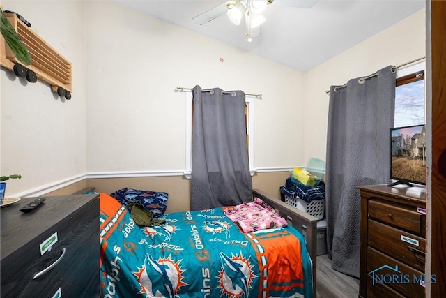 4526 Eastway St, Toledo, OH 43612 - bedroom featuring wood finished floors, a ceiling fan, and vaulted ceiling