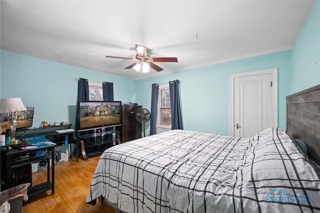 4526 Eastway St, Toledo, OH 43612 - bedroom with a ceiling fan and wood finished floors