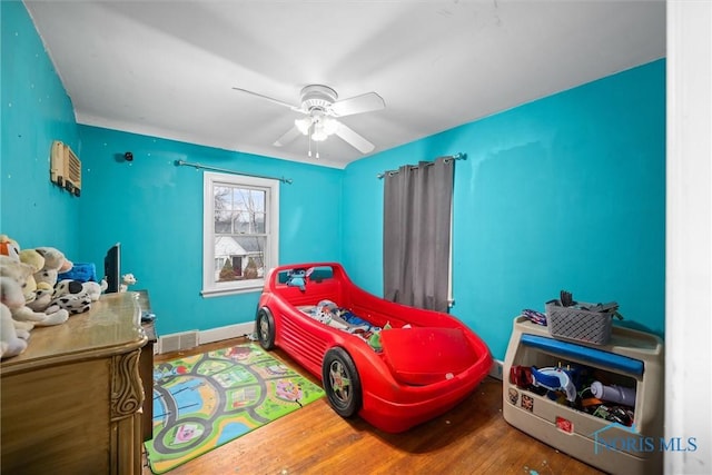 4526 Eastway St, Toledo, OH 43612 - bedroom featuring a ceiling fan, wood finished floors, visible vents, and baseboards