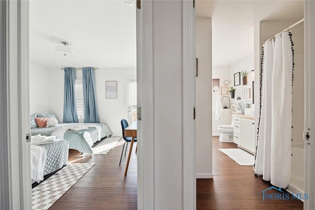 hallway featuring dark wood-type flooring