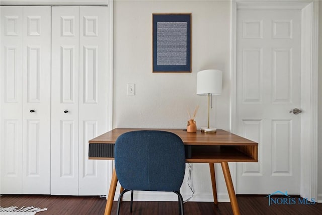 home office with dark wood-style flooring