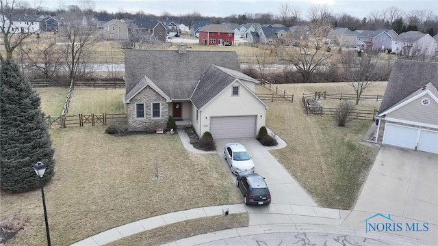 drone / aerial view with a residential view