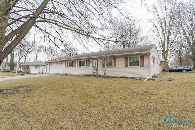 single story home with a garage, driveway, and a front lawn