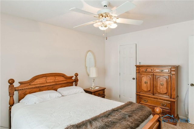 bedroom with a ceiling fan and light colored carpet