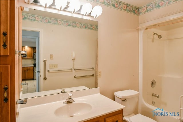 full bath with vanity, toilet, and bathing tub / shower combination