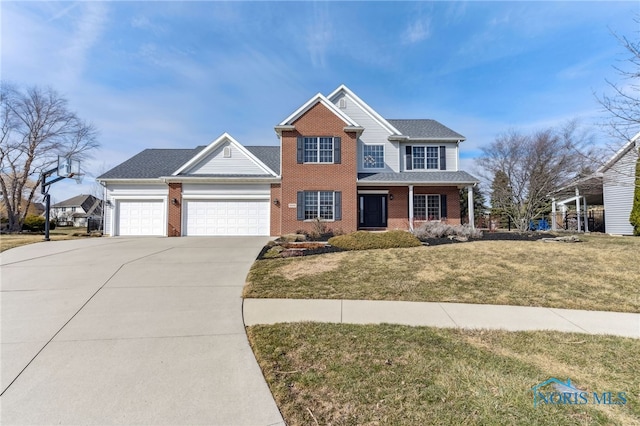 view of front of house with a garage, a front yard, concrete driveway, and brick siding