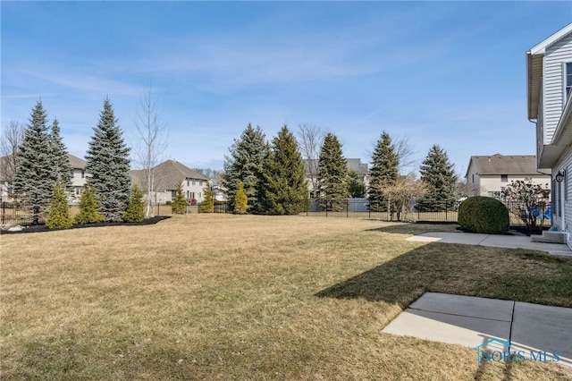 view of yard featuring fence