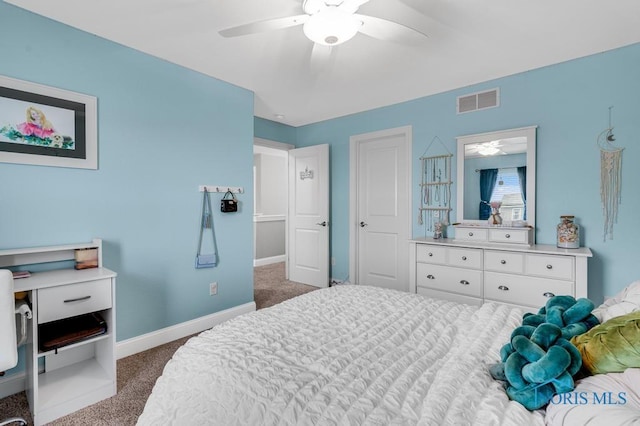 carpeted bedroom featuring visible vents, ceiling fan, and baseboards