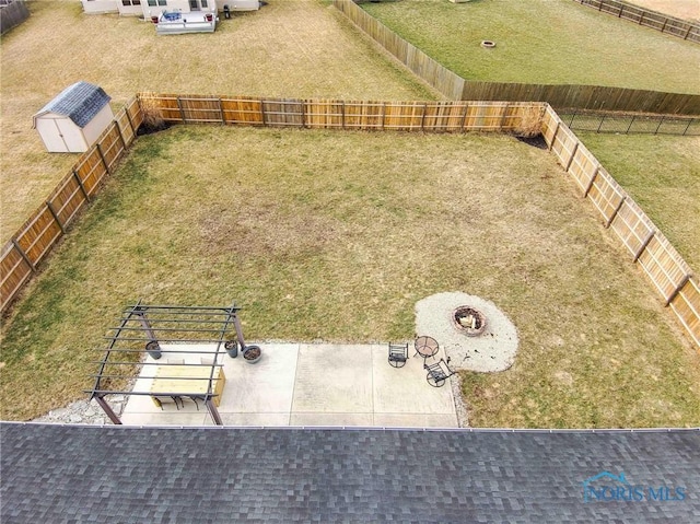 view of yard with a fenced backyard and a patio