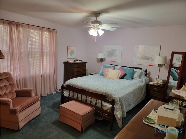 carpeted bedroom featuring a ceiling fan