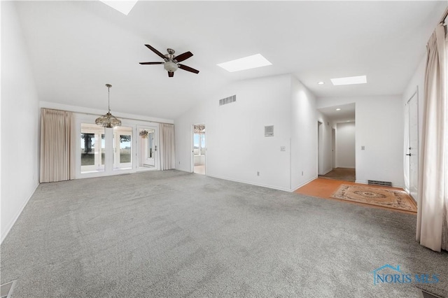 unfurnished living room with visible vents, a ceiling fan, carpet flooring, high vaulted ceiling, and recessed lighting