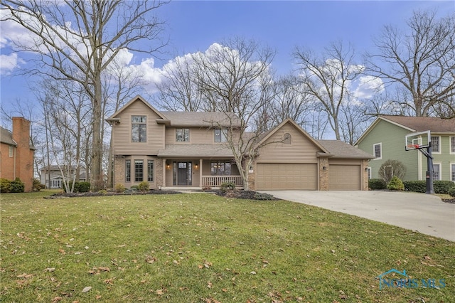 view of front of property with brick siding, a porch, a front yard, a garage, and driveway