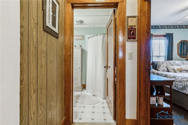 hall featuring tile patterned floors