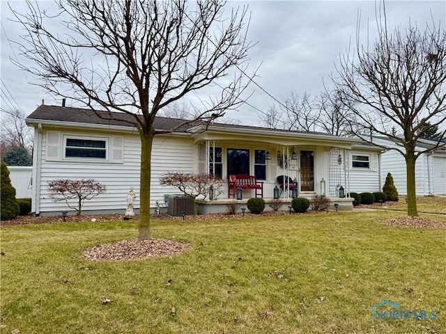 ranch-style home featuring a porch, a front yard, and cooling unit