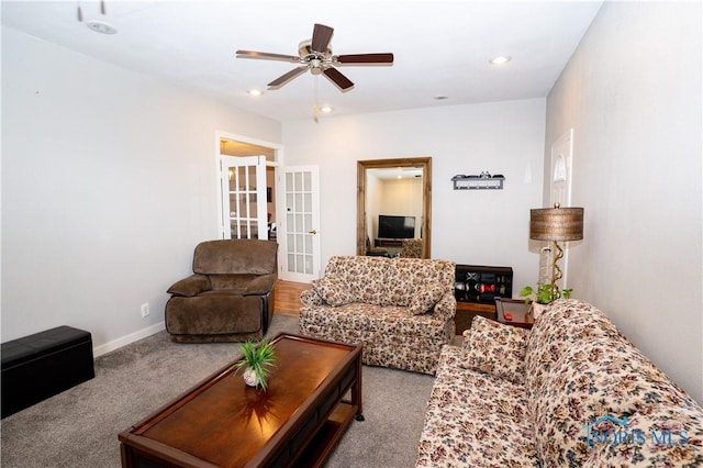 living area featuring carpet floors, french doors, recessed lighting, ceiling fan, and baseboards