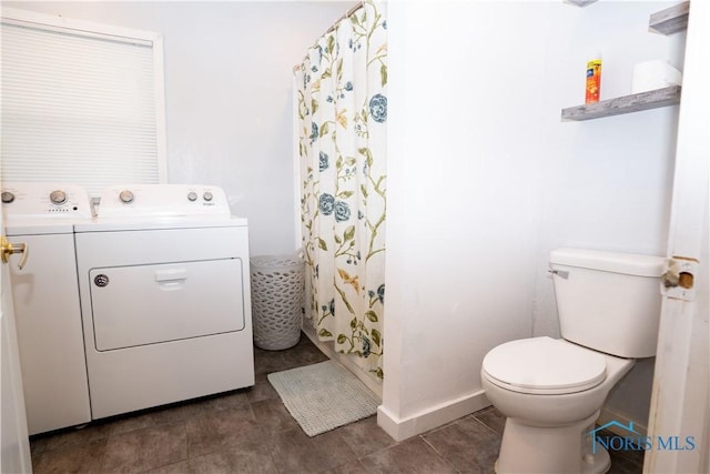 washroom featuring tile patterned flooring, washer / clothes dryer, baseboards, and laundry area