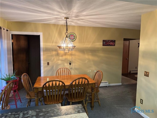 dining room featuring a baseboard radiator, carpet, a baseboard heating unit, and baseboards