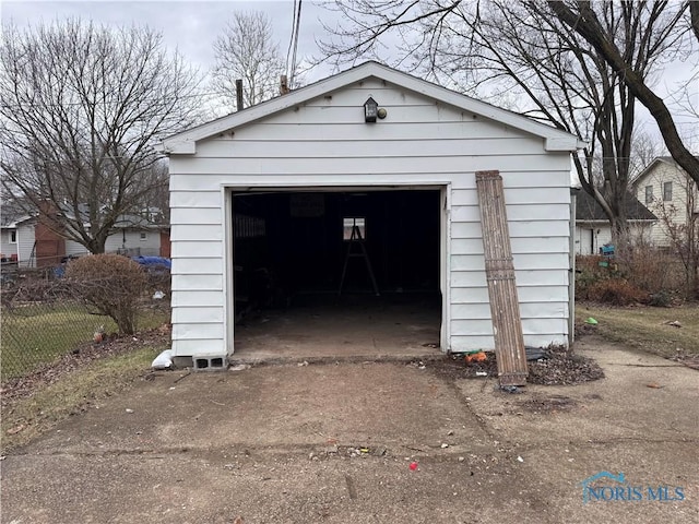 detached garage with fence