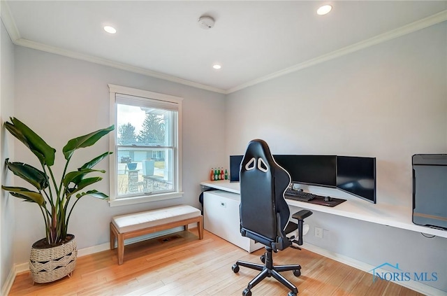 office area featuring light wood-style floors, baseboards, ornamental molding, and recessed lighting