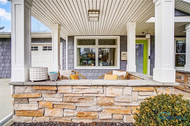 entrance to property with covered porch