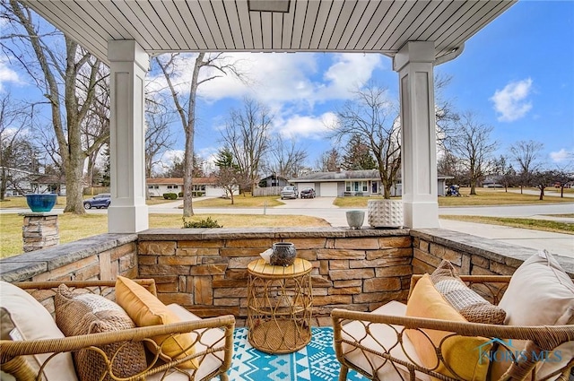 balcony featuring a porch