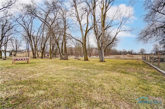 view of yard with fence