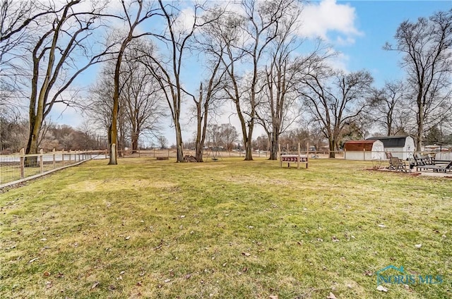 view of yard featuring fence