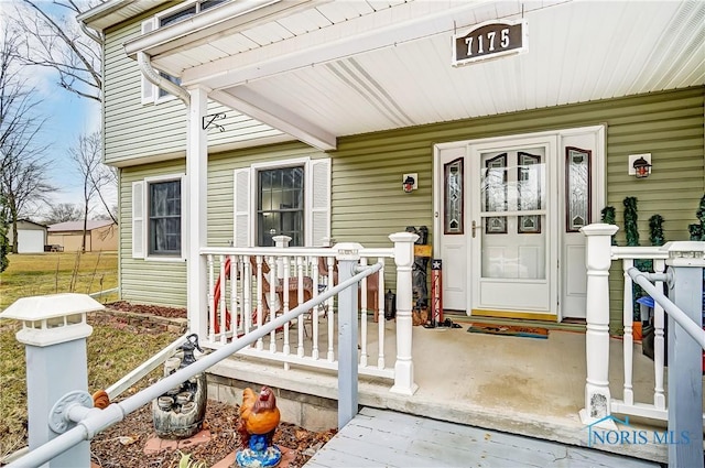 doorway to property with a porch