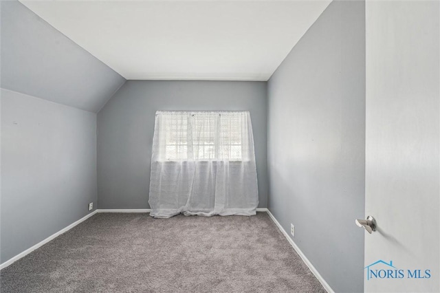 bonus room featuring carpet, lofted ceiling, and baseboards