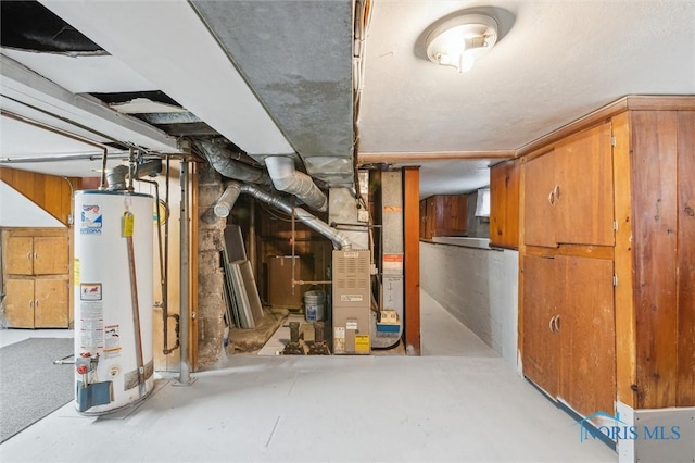 utility room featuring water heater