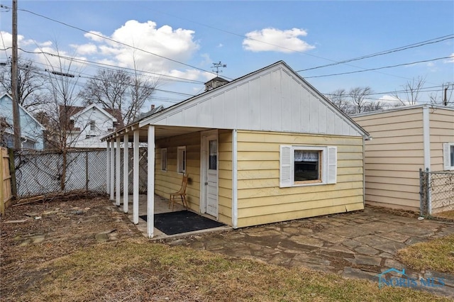 view of outdoor structure featuring a fenced backyard