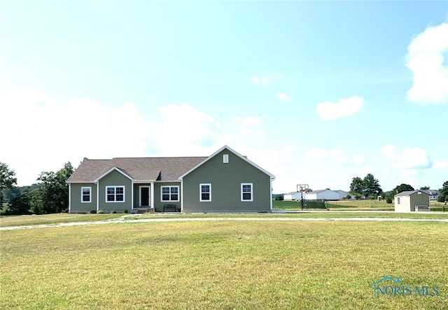 ranch-style home with a front lawn