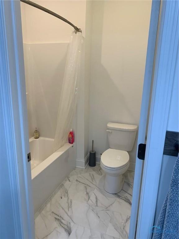 bathroom with baseboards, marble finish floor, toilet, and shower / tub combo with curtain