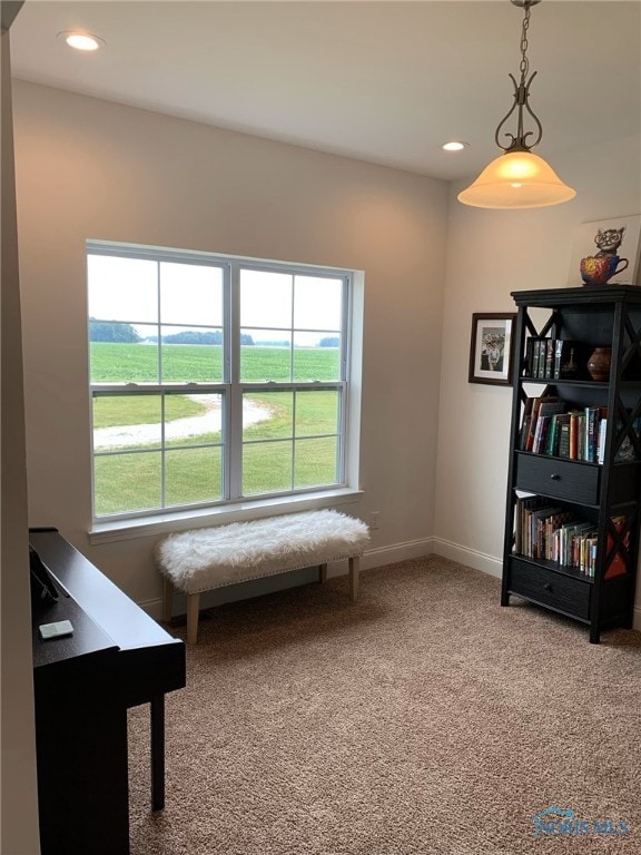 sitting room with recessed lighting, carpet flooring, and baseboards