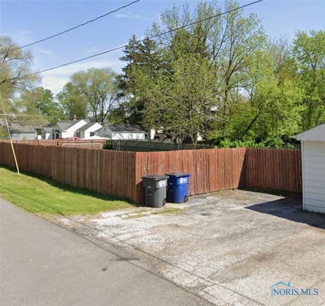 exterior space featuring fence private yard