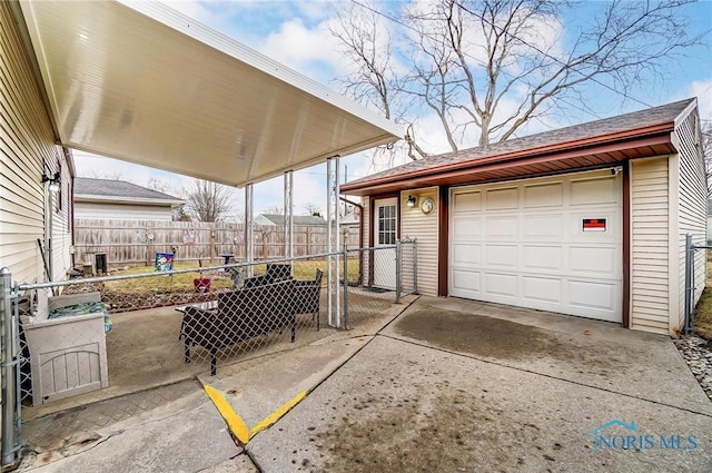 garage with fence