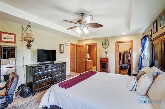 bedroom featuring ensuite bath, carpet, a spacious closet, a closet, and recessed lighting