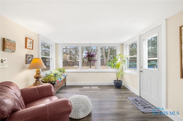 sunroom / solarium featuring a wealth of natural light