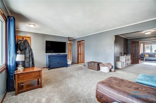 living room featuring carpet floors and crown molding