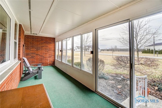 view of unfurnished sunroom