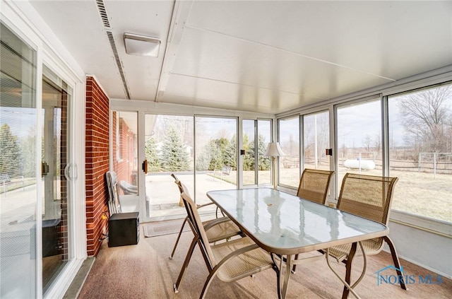 sunroom featuring plenty of natural light