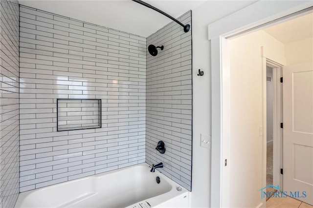 bathroom with washtub / shower combination