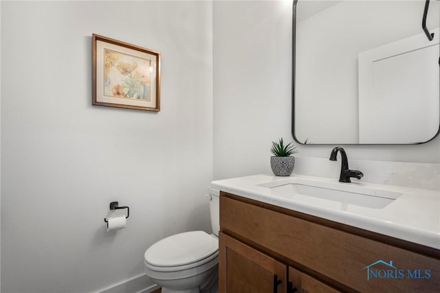 half bath with toilet and vanity