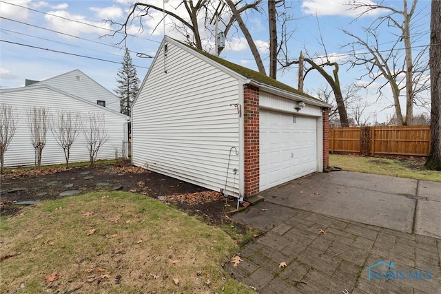 detached garage with fence