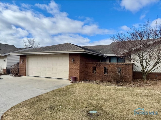 view of property exterior featuring brick siding, driveway, an attached garage, and a lawn