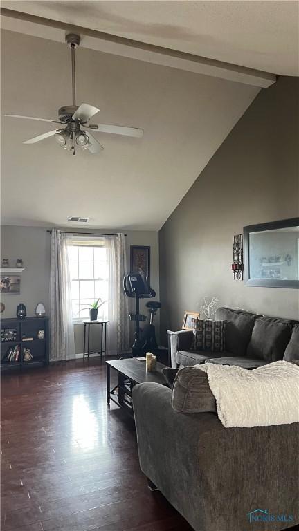 living room with beam ceiling, visible vents, a ceiling fan, wood finished floors, and high vaulted ceiling