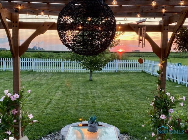 view of yard featuring a fenced backyard and a pergola